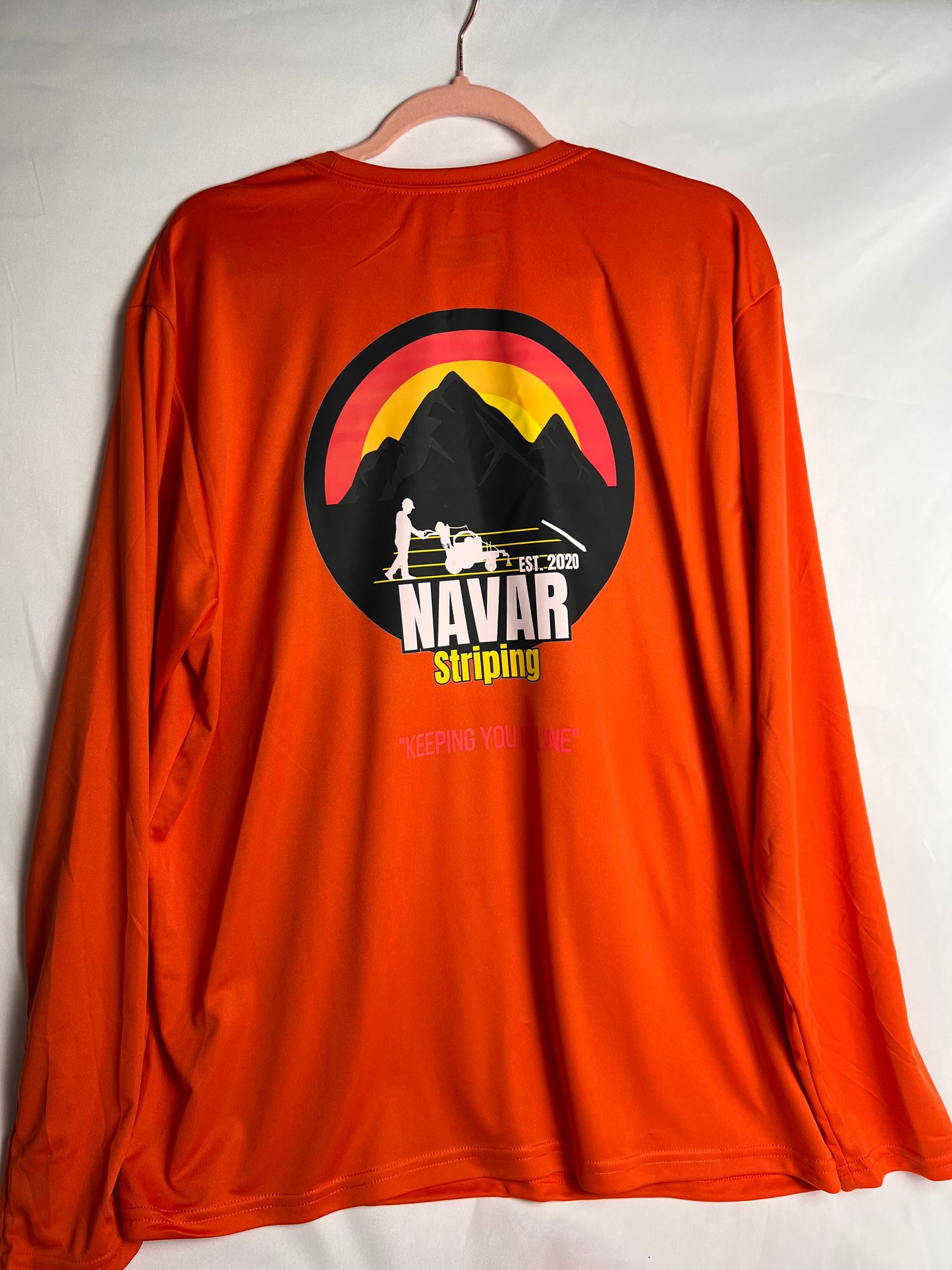 Back of the orange hi-viz shirt with a large full-color custom business logo
