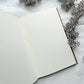 Blank cream pages inside the kraft junk journal
