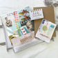 Junk journal kit with the Assorted Ephemera Pack, kraft journal, mini Junk Journaling notebook and sampler pack