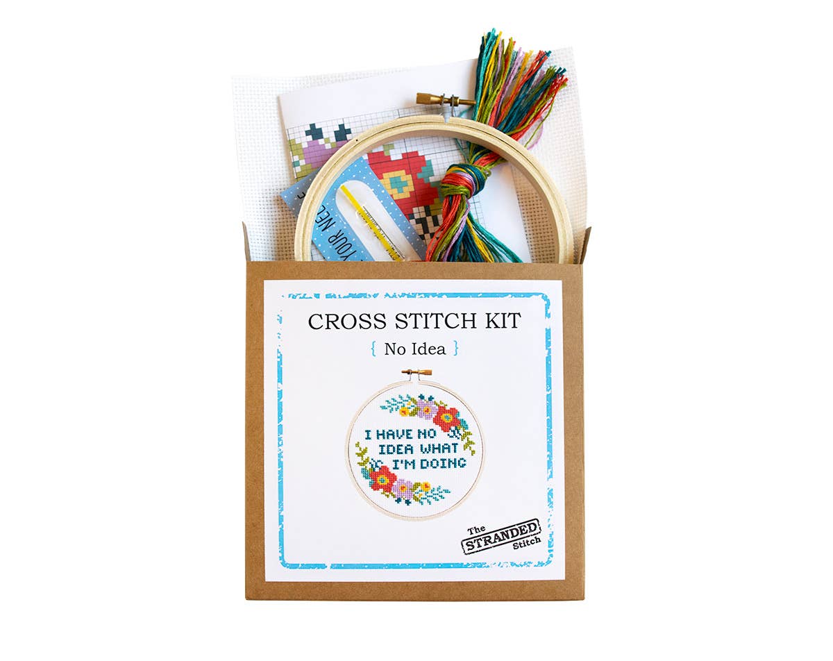No Idea cross stitch kit box with the hoop, fabric, colorful floss and needle card peeking out
