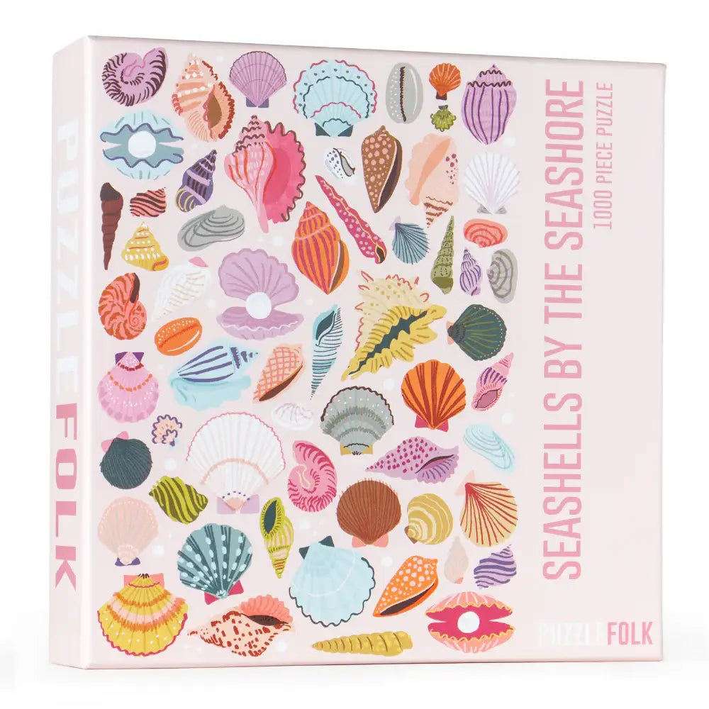 Seashells by the Seashore 1000-piece puzzle box by Puzzlefolk covered in pastel illustrated seashells