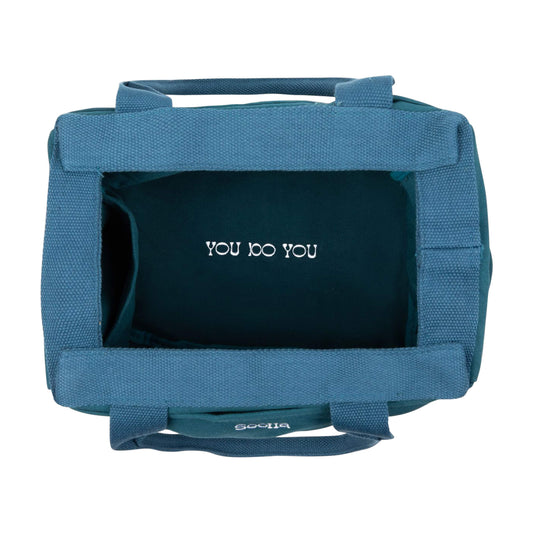 Top view inside the bag, lining printed "You do you"