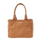 Front of the cinnamon brown Soolla craft bag with slanted tool pockets