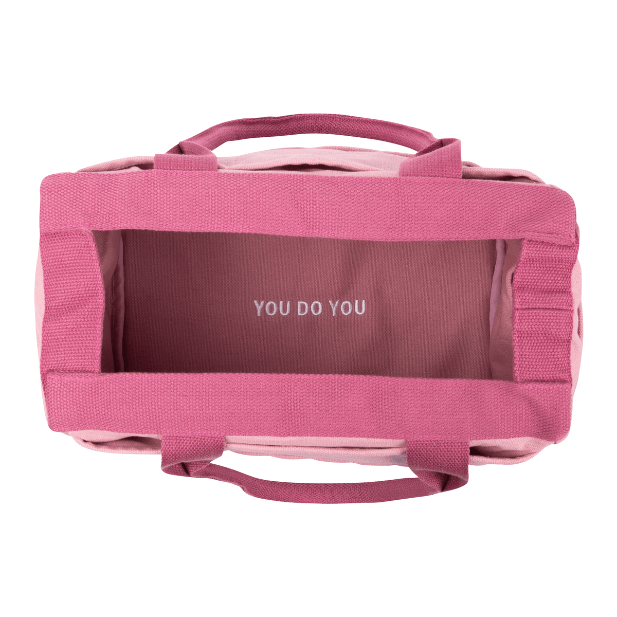 Top view inside the pink Soolla craft bag, lining printed "You do you"