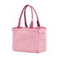 Angled view of the dusty pink Soolla craft bag with raspberry handles