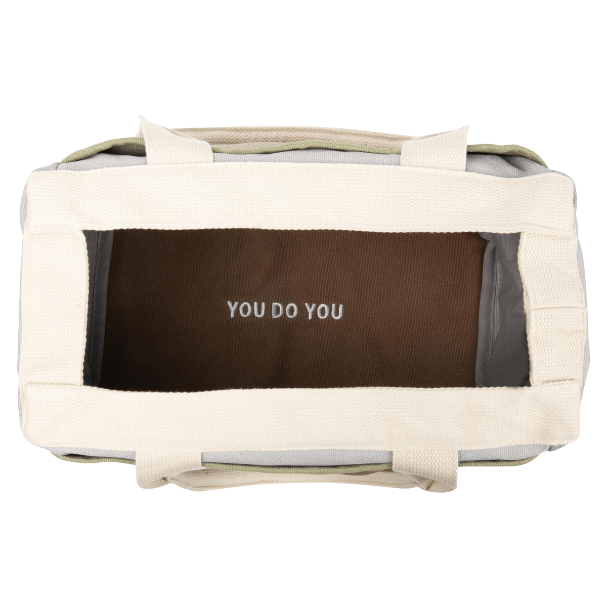 Top view inside the Good Earth Soolla craft bag, brown lining printed "You do you"