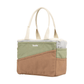 Angled view of the Good Earth Soolla craft bag in sage green, gray and brown with cream handles