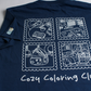Dark blue Cozy Coloring T-Shirt with kawaii coloring book graphic, back view