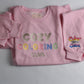 Pink Cozy Coloring Club crewneck with a Color your Calm design on the sleeve