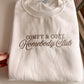 Folded white Homebody Club crewneck with brown embroidery