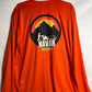 Back of the orange hi-viz shirt with a large full-color custom business logo