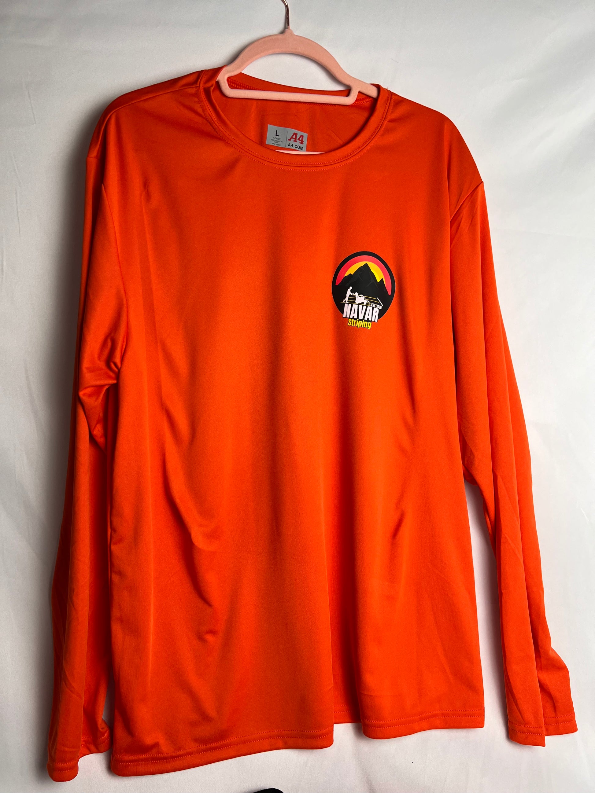 Orange long-sleeve hi-viz performance shirt with a small custom business logo on the chest