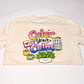 Cream T-shirt laid flat showing the Color your Calm back print