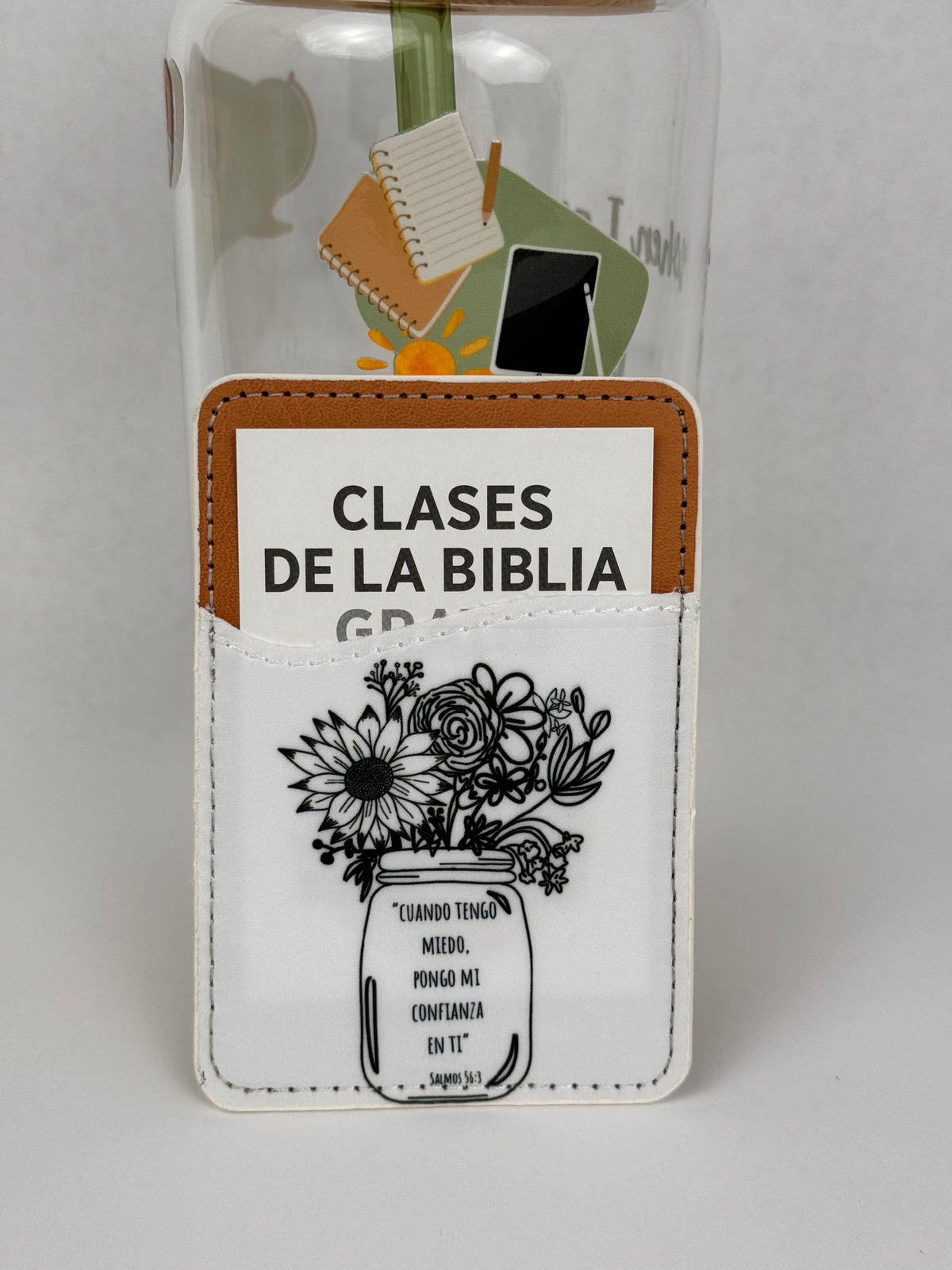 Phone card wallet with a black line-art flower jar and the Salmos 56:3 quote