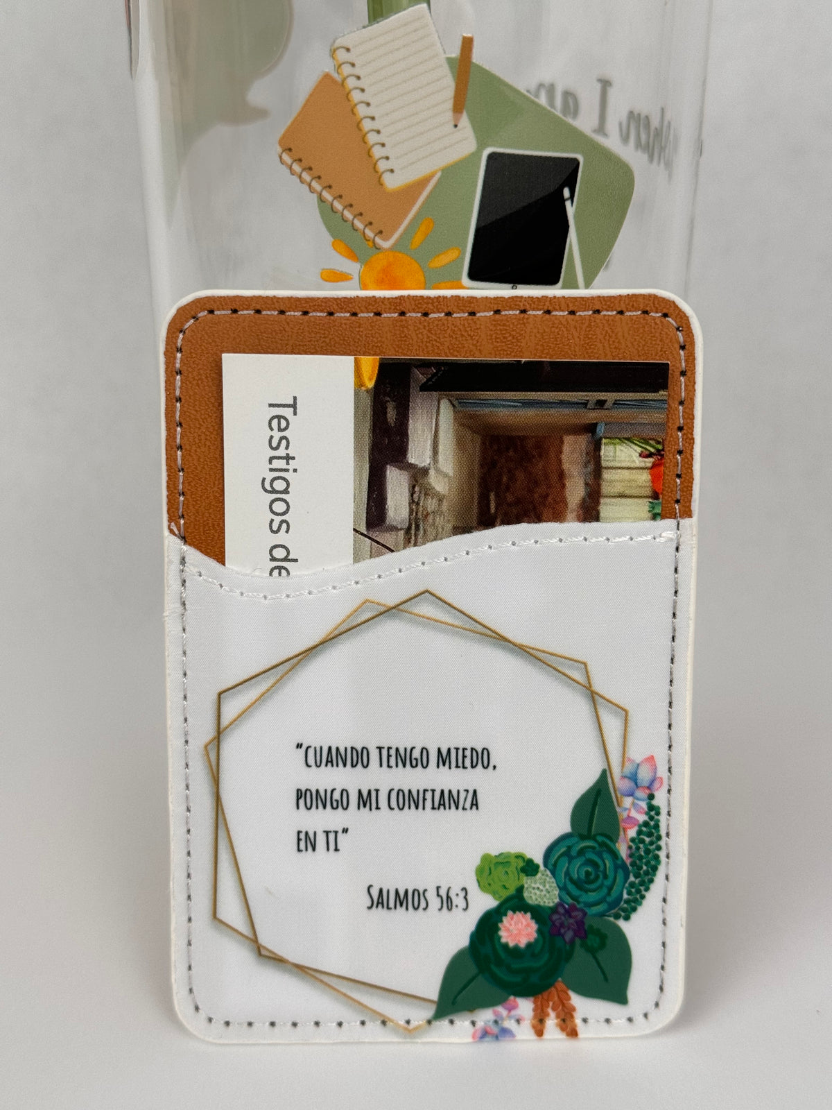 Phone card wallet with a gold geometric frame, teal flowers and the Salmos 56:3 quote