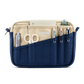 Navy and cream Soolla stationery pouch holding scissors, pens and a notepad