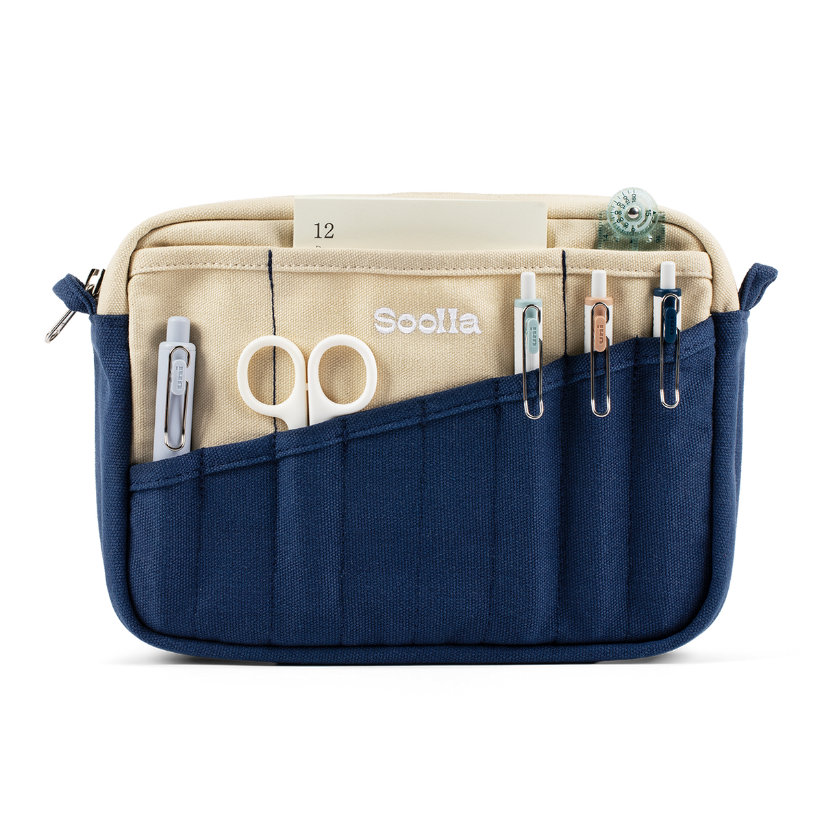 Navy and cream Soolla stationery pouch holding scissors, pens and a notepad