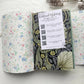 Journal Making Inspiration card with QR codes for video tutorials, tucked into a floral journal insert