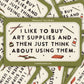 Olive green Molly Illustration sticker reading "I like to buy art supplies and then just think about using them" with pencils and paint