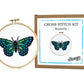 Butterfly cross stitch hoop beside The Stranded Stitch kit box