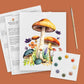 Mushroom watercolor kit: printed toadstool and wildflower outline, eight-color paint card, brush and practice sheets